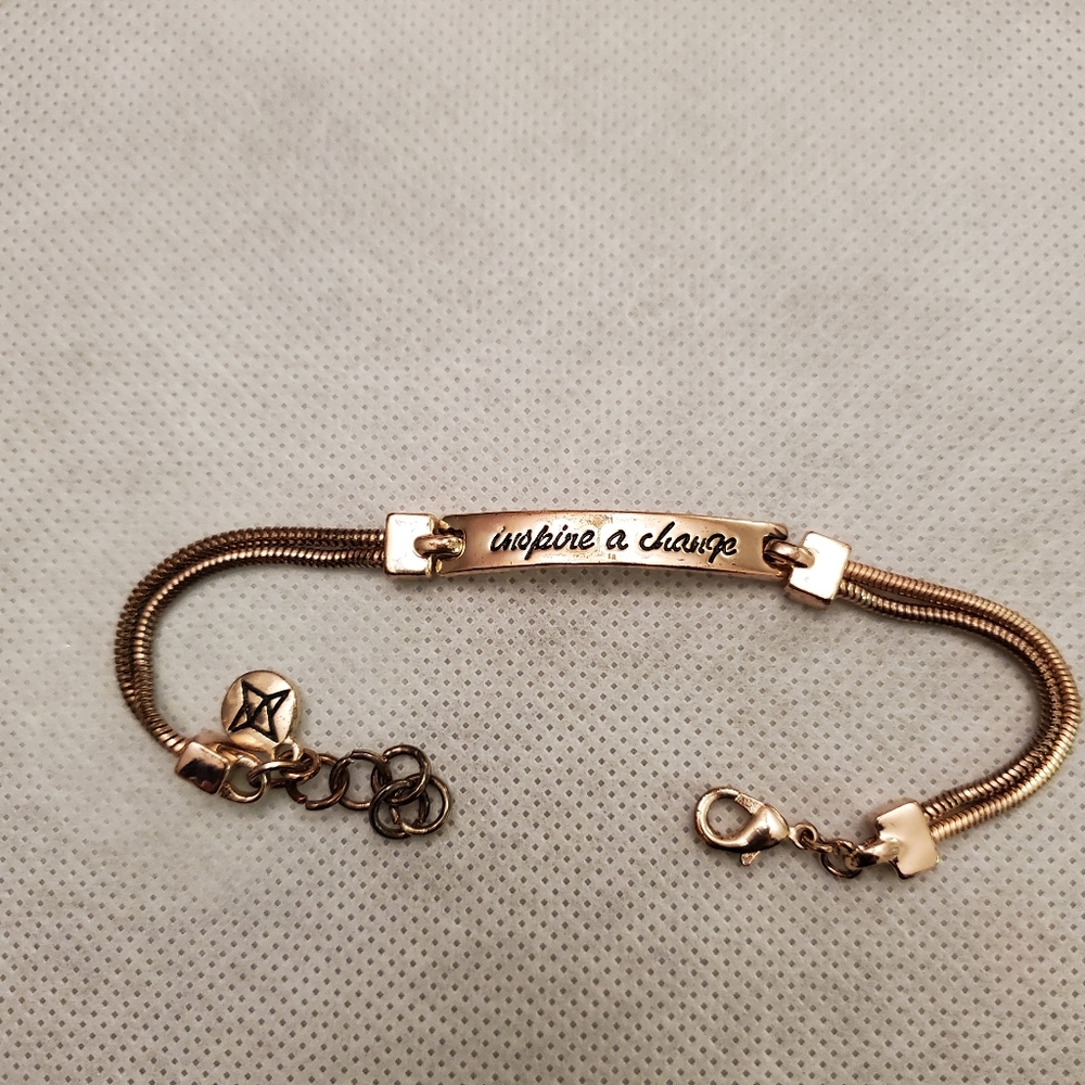 BCBG "INSPIRE A CHANGE" Rose Gold Tone Bracelet